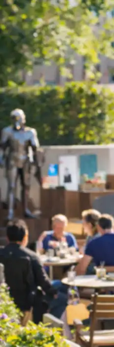 Visitors using Wi-Fi in a museum and outdoor café at a heritage visitor attraction